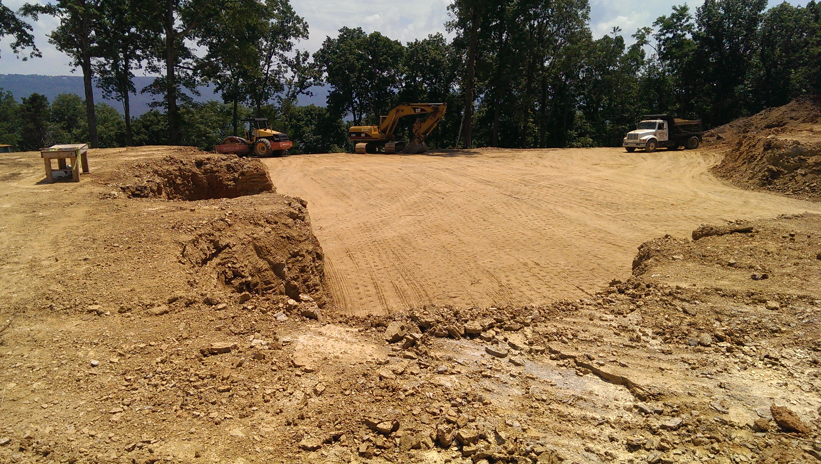 Excavation, Site Preparation, Digging, Leveling.