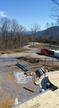 View from 2nd floor front balcony (directly above the front door) looking down the driveway. Here is where you would stand when negotiating with the goblin horde trying to get in. 